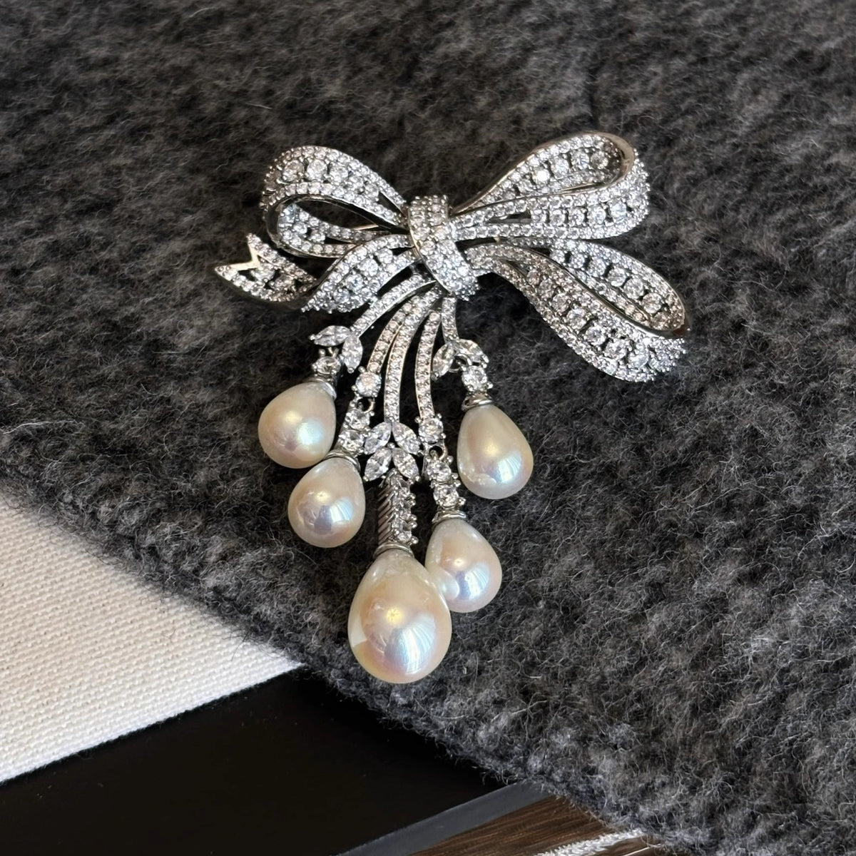 Affordable Luxury Full-Pavé Bow and Pearl Brooch