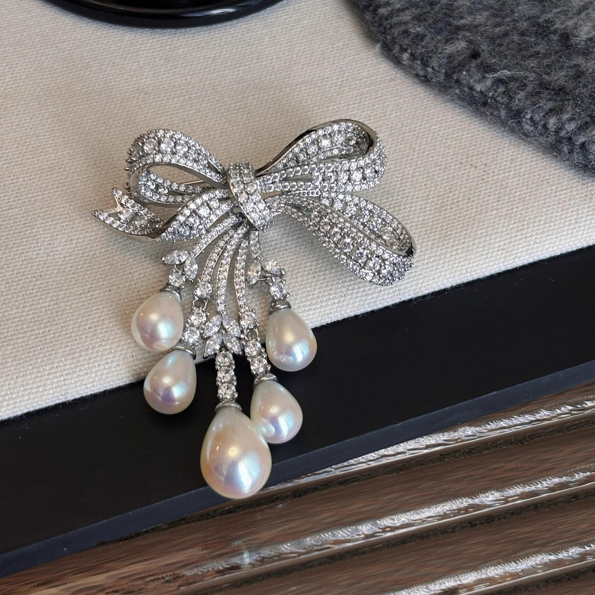 Affordable Luxury Full-Pavé Bow and Pearl Brooch