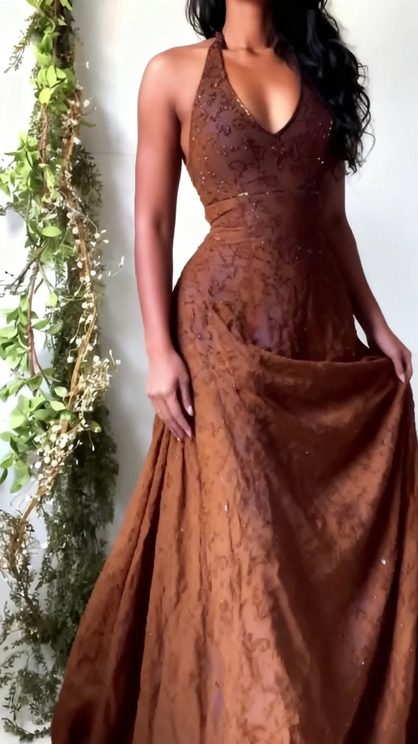 Model wearing a vintage-style purple lace mermaid dress at a formal gala, jewel-tone evening wear inspiration for Pinterest.